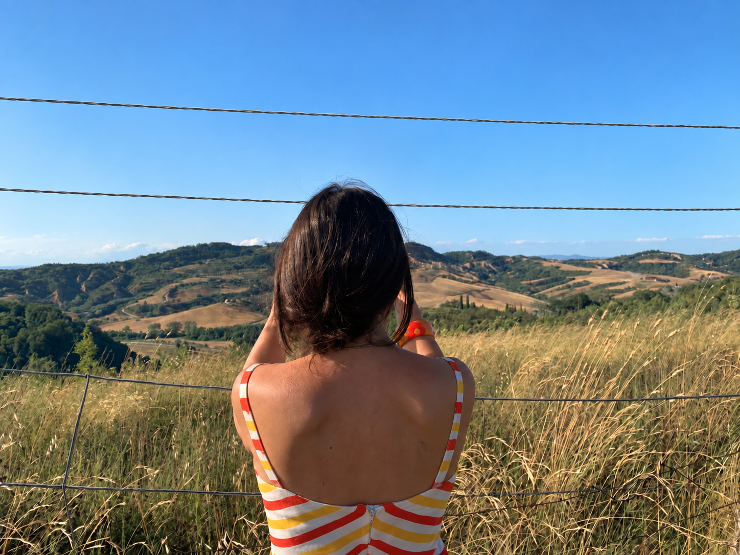 Eleonora Mastropietro looking at a hilly landscape